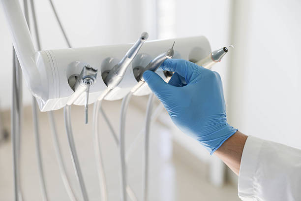 Professional Emergency Dentist technician working in Lowell, MA